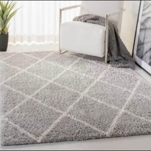 Brand new 6’7” x 9’ gray & cream area rug from Wayfair